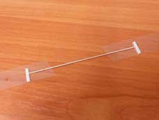 Кріплення стрічки резинкою.